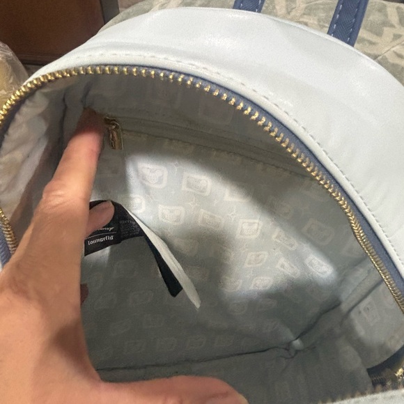 Loungefly White and Blue Backpack with Mickey Mouse and Disney World Design - Picture 9 of 17